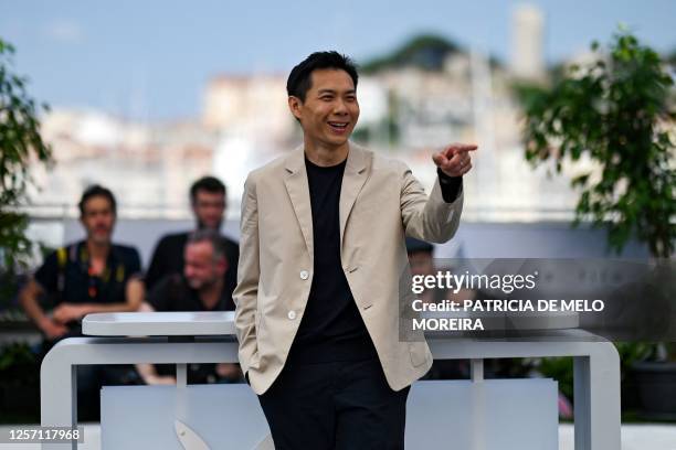 Singaporean director Anthony Chen gestures during a photocall for the film "Ran Dong" at the 76th edition of the Cannes Film Festival in Cannes,...
