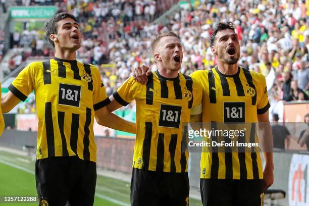 Giovanni Reyna of Borussia Dortmund, Marco Reus of Borussia Dortmund and Mats Hummels of Borussia Dortmund celebrate after the Bundesliga match...