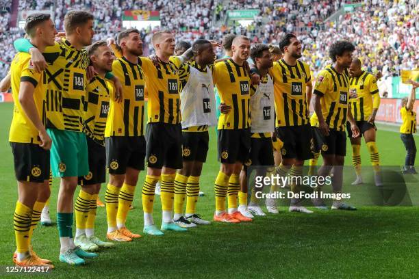 The player's of Borussia Dortmund celebrate after winning the Bundesliga match between FC Augsburg and Borussia Dortmund at WWK-Arena on May 21, 2023...