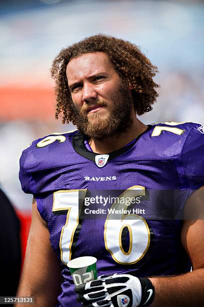 Jah Reid of the Baltimore Ravens watch a replay on the scoreboard during a game against the Tennessee Titans at LP Field on September 18, 2011 in...