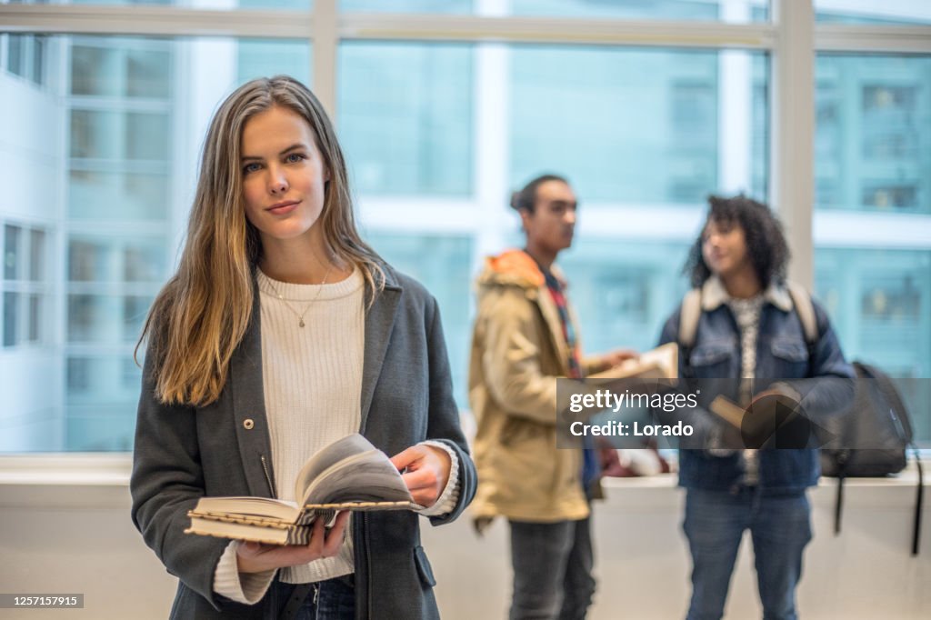 Beautiful female university student on campus