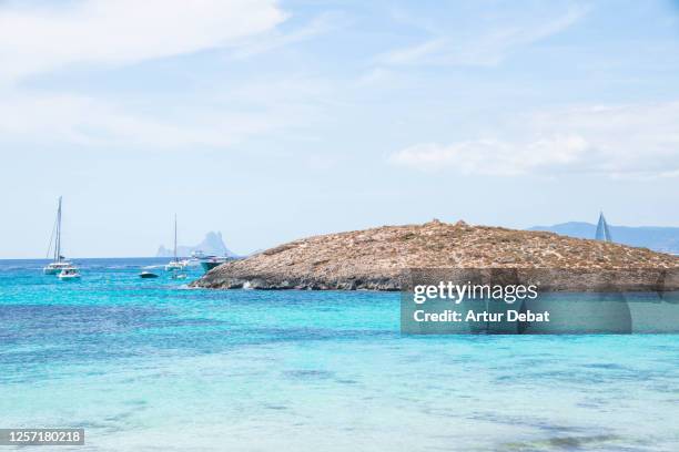 paradaise beach in formentera island with crystal water. playa de ses illetes en la isla de formentera. - en la playa ストックフォトと画像