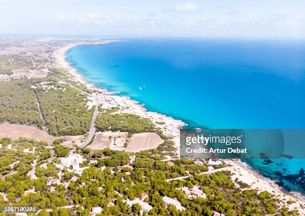aerial view of the formentera island with paradise beach in the mediterranean sea. toma aérea de la isla de formentera con playas paradisiacas. - vista aérea stock pictures, royalty-free photos & images