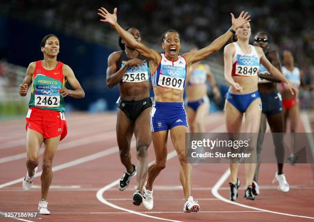 Kelly Holmes of Great Britain celebrates after she win gold in the women's 800 metre final on August 23, 2004 during the Athens 2004 Summer Olympic...