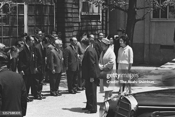 Emperor Hirohito and Empress Nagako are seen off by their daughter Atsuko Ikeda at the Okayama University Hospital on May 8, 1965 in Okayama, Japan.