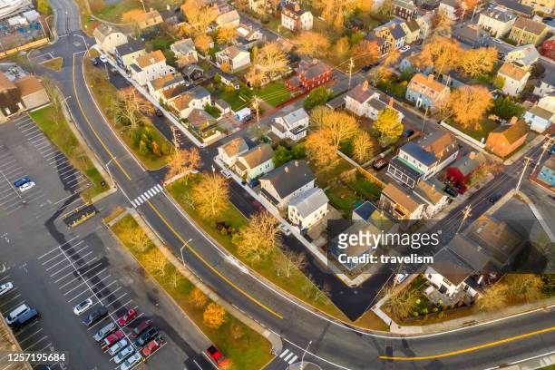 drone aerial view of newport phode island old tradition building with ocean and yatch port with street summer season - rhode island homes stock pictures, royalty-free photos & images