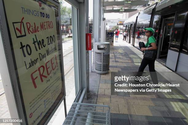 Sign advertising METRO's Labor Day free ride promotion at a METRO light rail stop in the 1900 block of Main Street Friday, Aug. 9 in Houston.