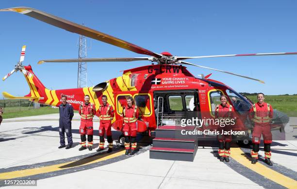 The air crew pose ahead of a visit by Camilla, Duchess of Cornwall to the Cornwall Air Ambulance Trust to launch the new "Duchess of Cornwall"...
