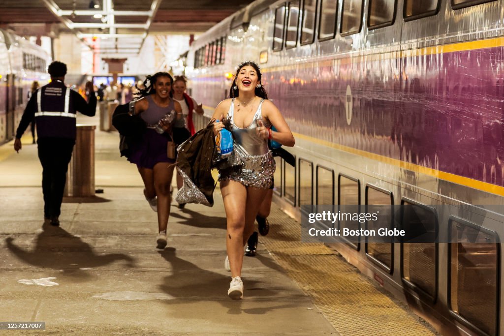 Taylor Swift Railed Taylor Swift fans run to catch the commuter line to Gillette Stadium ...