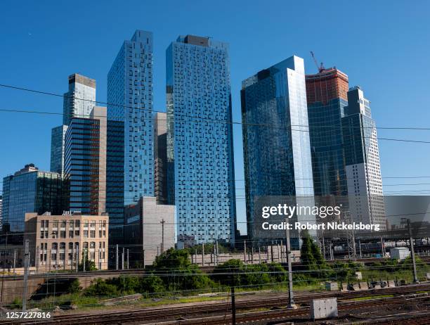 Three residential apartment buildings known as Jackson Park stand near railroad tracks July 12, 2020 in Long Island City in the Queens borough of New...