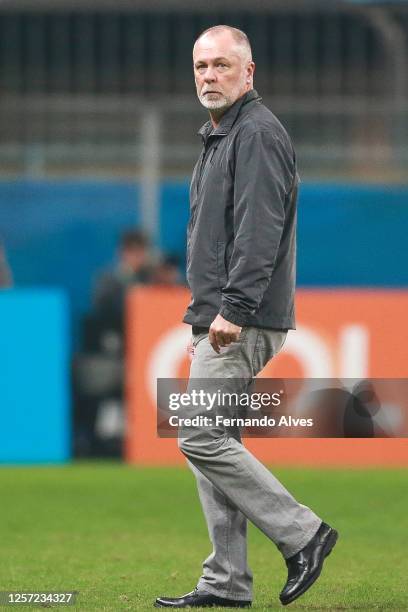 Mano Menezes coach of Internacional looks on during a Brasileirao match between Gremio and Internacional at Arena do Gremio on May 21, 2023 in Porto...