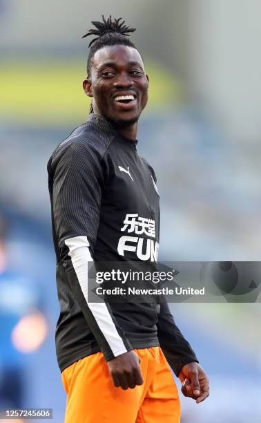 Christian Atsu of Newcastle United warms up prior to the Premier League match between Brighton & Hove Albion and Newcastle United at American Express...