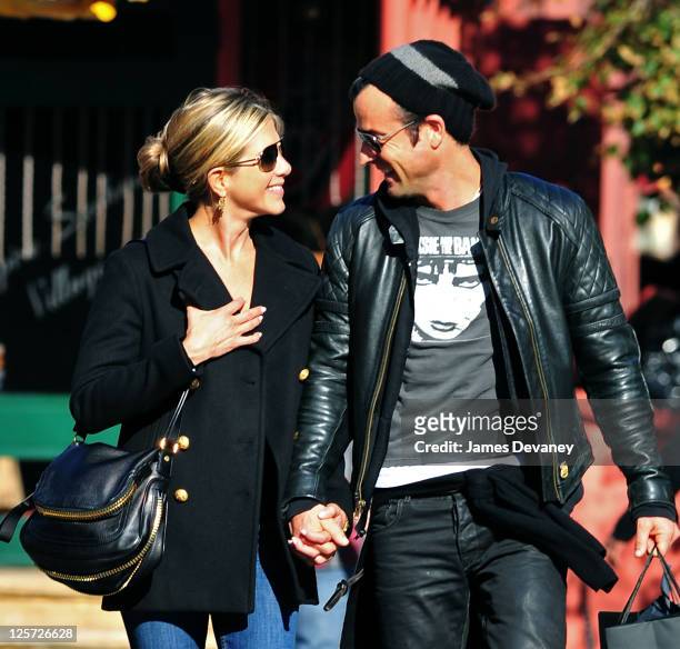 Jennifer Aniston and Justin Theroux walk in the West Village on September 18, 2011 in New York City.
