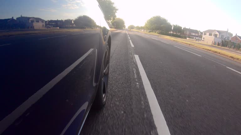 https://media.gettyimages.com/id/1257273685/video/driving-down-road.jpg?b=1&s=640x640&k=20&c=vBbLH80xvpMCK0BVa1nyqGvm0bhhTontUd_McgHz7r4=