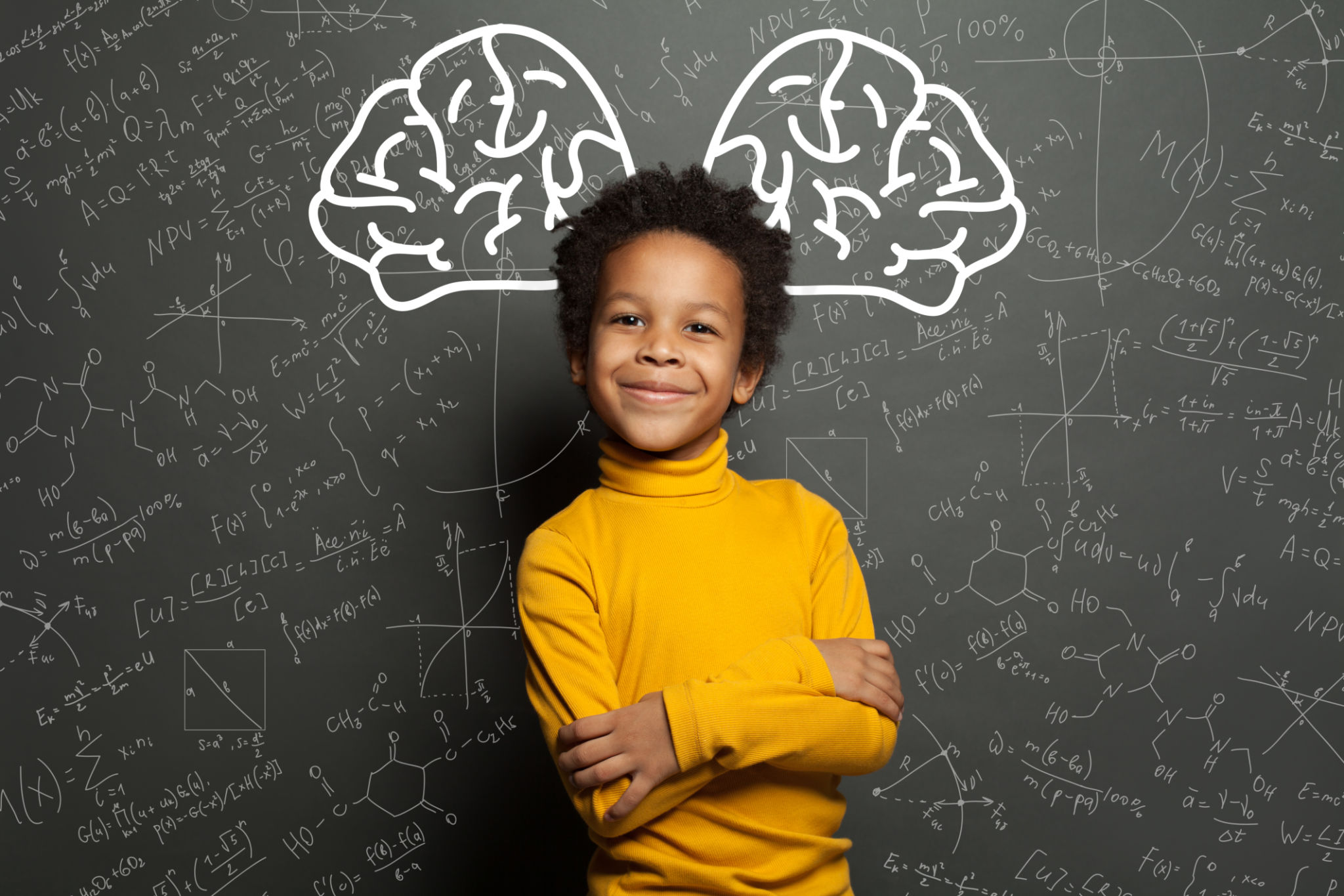 Smiling black child with big brain and science formulas on black, education and brainstorming concept Smiling black child with big brain and science formulas on black, education and brainstorming concept