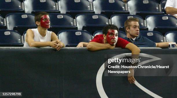 Houston fans sit dejected as they watch the final seconds tick off the clock as Houston went on to lose to Miami 13-38 during the fourth quarter of...