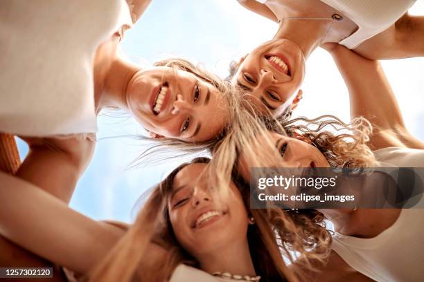 smiled and relaxed women - girl power imagens e fotografias de stock