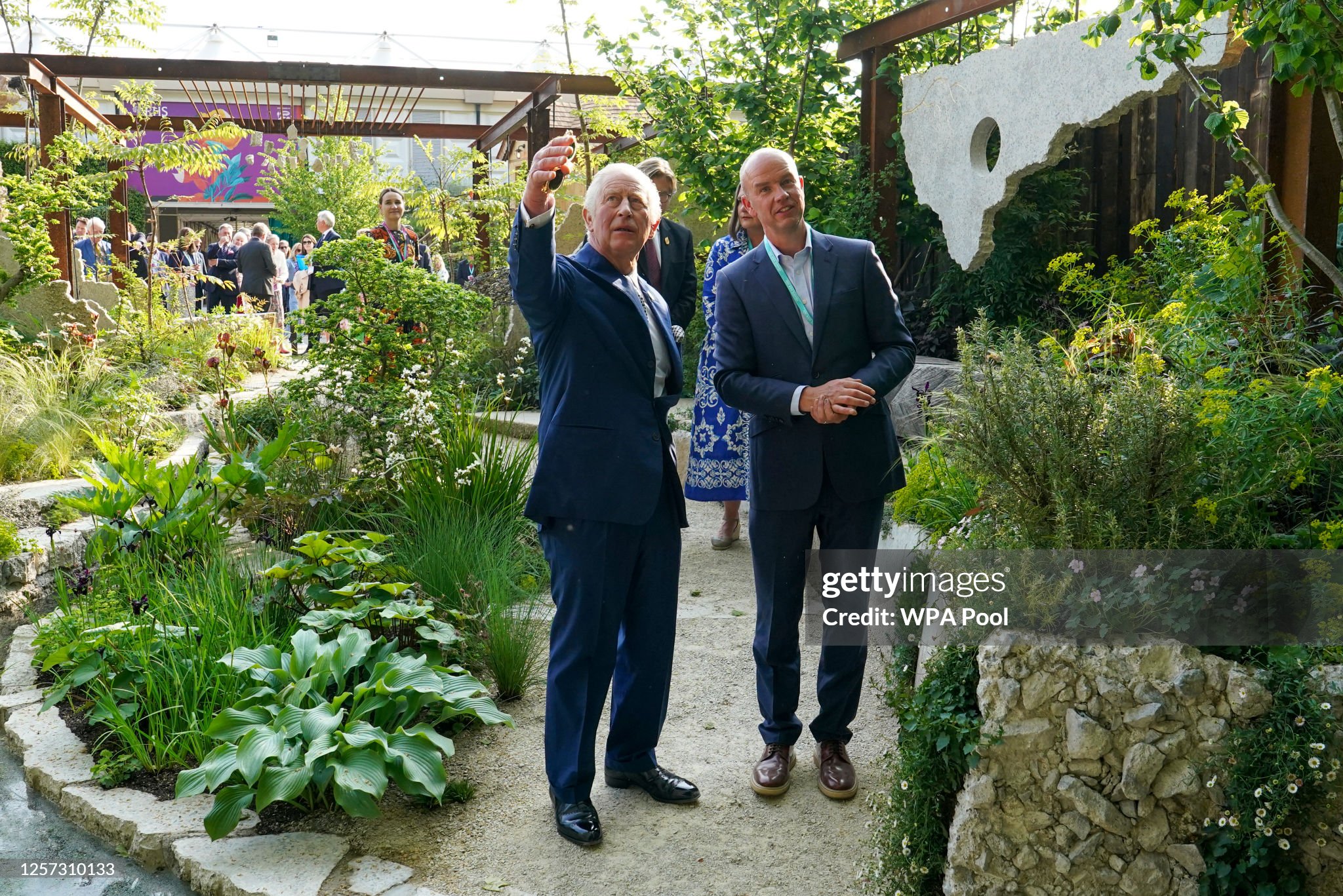 britains-king-charles-iii-visits-the-raymond-evison-clematis-stand-at-the-chelsea-flower-show.jpg
