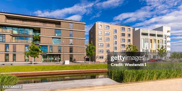 germany, baden-wrttemberg, heilbronn, neckar, district of neckarbogen, new energy efficient apartment buildings - heilbronn stock-fotos und bilder