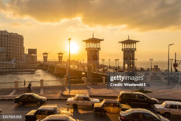egypt, alexandria, stanley bridge at sunset - alexandria egypt stock pictures, royalty-free photos & images