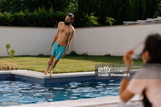 Falling Pool Guy Falling Into Pool Photos and Premium High Res Pictures - Getty Images
