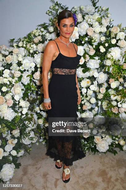 Helena Christensen attends a party hosted by British Vogue and Chopard to celebrate the Cannes Film Festival at Hotel Martinez on May 22, 2023 in...