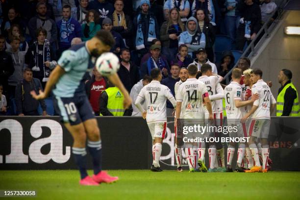 Valenciennes players celebrate after scoring their second goal during the French L2 football match between Le Havre AC and Valenciennes FC at the...