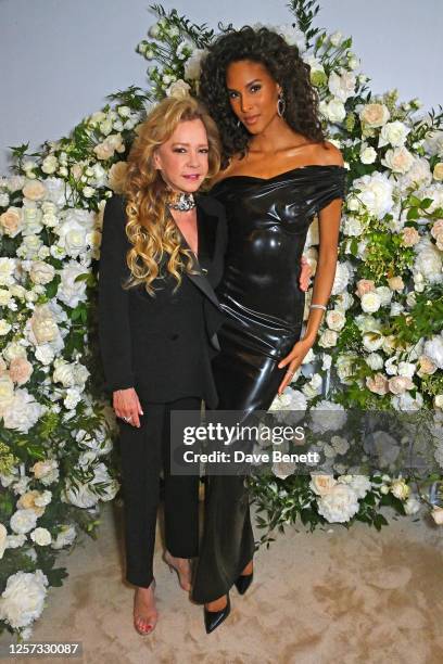 Chopard Co-President Caroline Scheufele and Cindy Bruna attend a party hosted by British Vogue and Chopard to celebrate the Cannes Film Festival at...