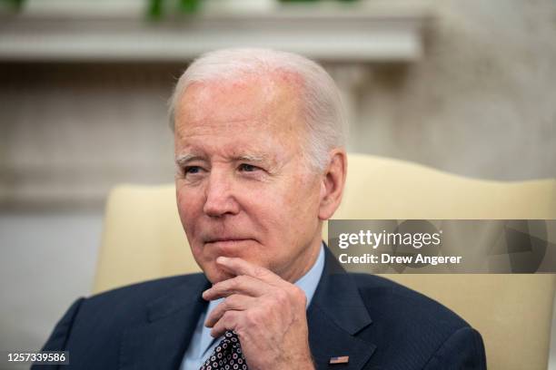 President Joe Biden meets with House Speaker Kevin McCarthy in the Oval Office of the White House on May 22, 2023 in Washington, DC. Biden and...