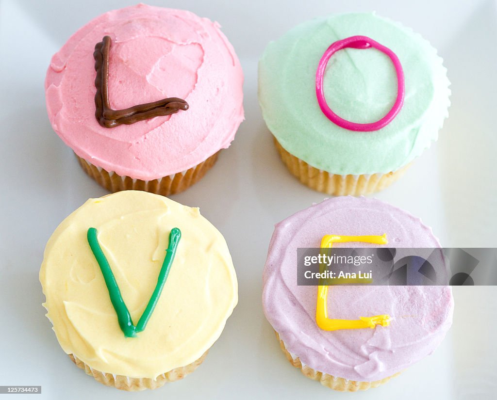Cupcakes With Letter Icing Love High-Res Stock Photo - Getty Images