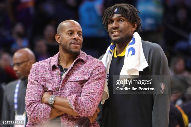 Andre Iguodala and Kevon Looney of the Golden State Warriors talk during the game against the Phoenix Suns on November 16, 2022 at Footprint Center...