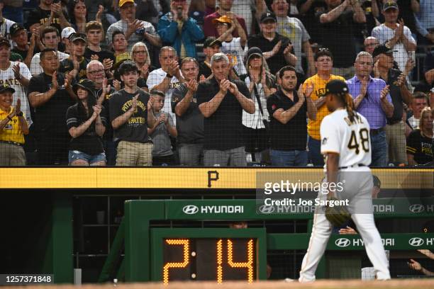 Fans cheer as Luis L. Ortiz of the Pittsburgh Pirates leaves the field during the game between the Texas Rangers and the Pittsburgh Pirates at PNC...