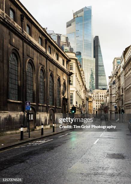 an empty street in the city of london - london lockdown stock pictures, royalty-free photos & images