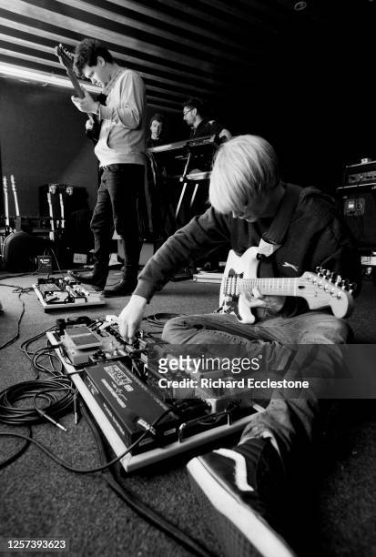 Joe Newman and Gwil Sainsbury of UK indie band Alt-J with their guitar effects pedalboards, United Kingdom, 2012.