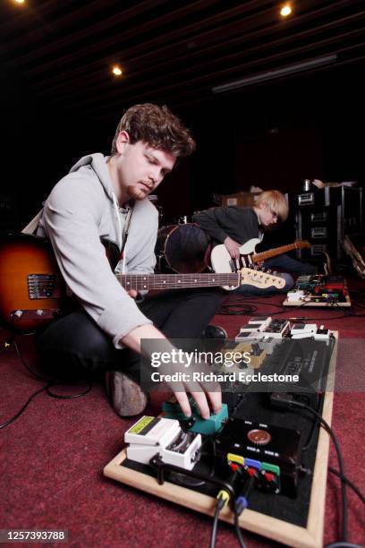 Joe Newman and Gwil Sainsbury of UK indie band Alt-J with their guitar effects pedalboards, United Kingdom, 2012.