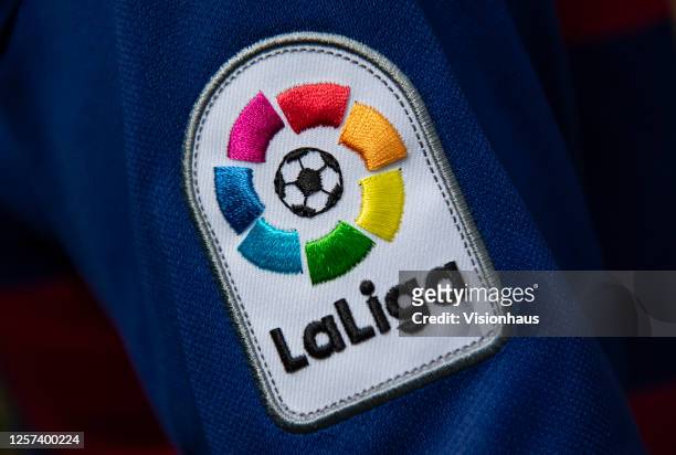 The La Liga logo on the arm of the FC Barcelona first team home shirt on July 19, 2020 in Manchester, United Kingdom.