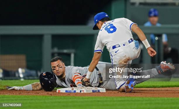 Javier Baez of the Detroit Tigers is tagged out at third base by Nicky Lopez of the Kansas City Royals during the tenth inning on May 22, 2023 in...