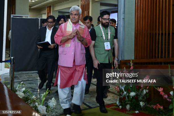 Lieutenant Governor of India's Jammu and Kashmir state Manoj Sinha arrives to attend a G20 tourism meeting at the SKICC convention centre in Srinagar...