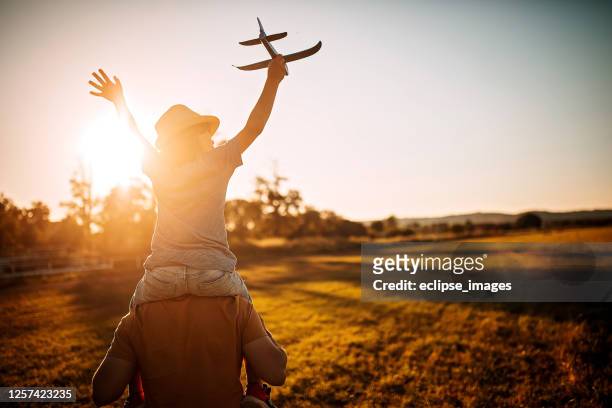 be free - carrying on shoulders stock pictures, royalty-free photos & images