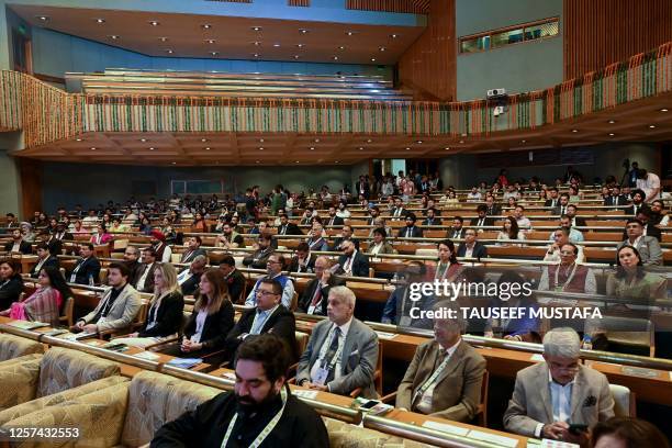 Delegates attend a G20 tourism meeting at the SKICC convention centre in Srinagar on May 23, 2023. A G20 tourism meeting began on May 22 under tight...