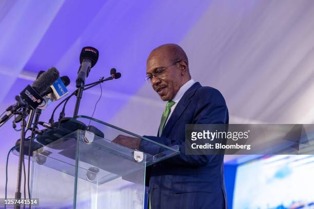Godwin Emefiele, governor of Nigeria's central bank, speaks during the commissioning ceremony of the Dangote Industries Ltd. Oil refinery and...