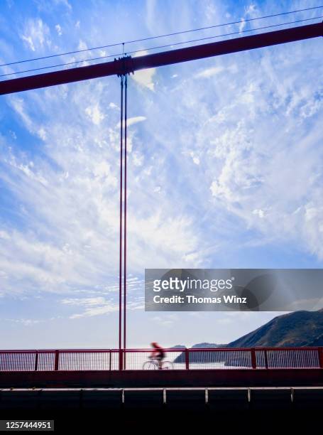 cyclist crossing the golden gate bridge - helping to cross the bridge stock pictures, royalty-free photos & images