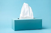 Blue tissue box on a blue background