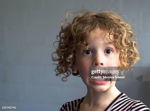 caucasian girl with scared face against - child shock studio stock pictures, royalty-free photos & images