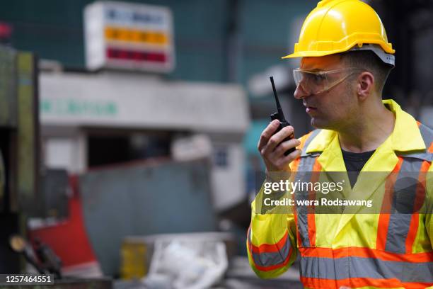 Worker Using Radio Radio Parts Photos and Premium High Res Pictures - Getty Images