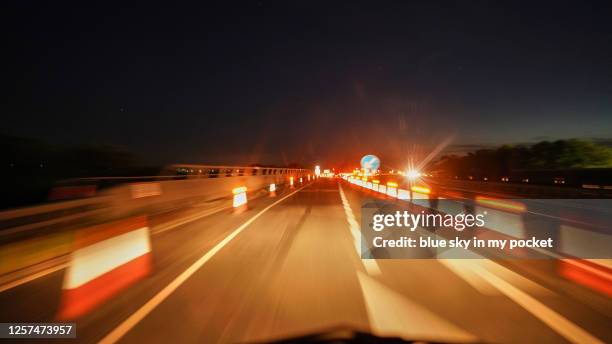 night driving blur - off highway vehicle stock pictures, royalty-free photos & images