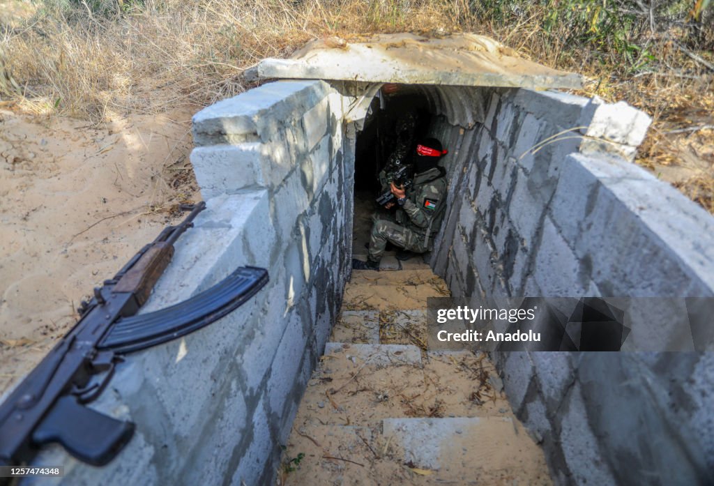 Soldiers of Democratic Front for the Liberation of Palestine stand guard in Gaza