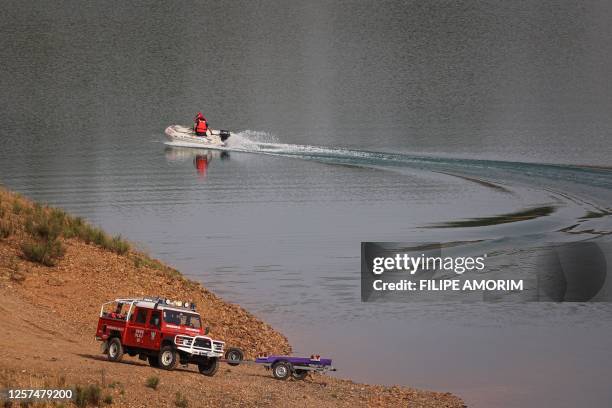 Portuguese firefighters work onboard a boat during a new search operation amid the investigation into the disappearance of Madeleine McCann in the...