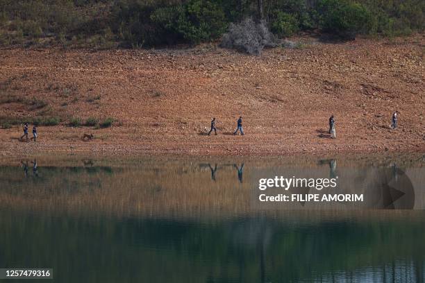 Portuguese authorities from the Judicial Police criminal investigation unit work during a new search operation amid the investigation into the...