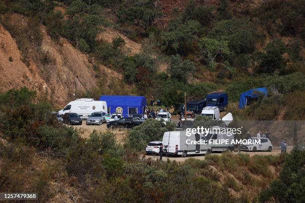 Portuguese authorities from the Judicial Police criminal investigation unit work during a new search operation amid the investigation into the...